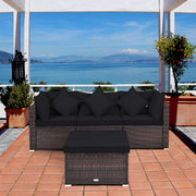Costway - 4 Pieces Ottoman Garden Patio Rattan Wicker Furniture Set with Cushion-Black