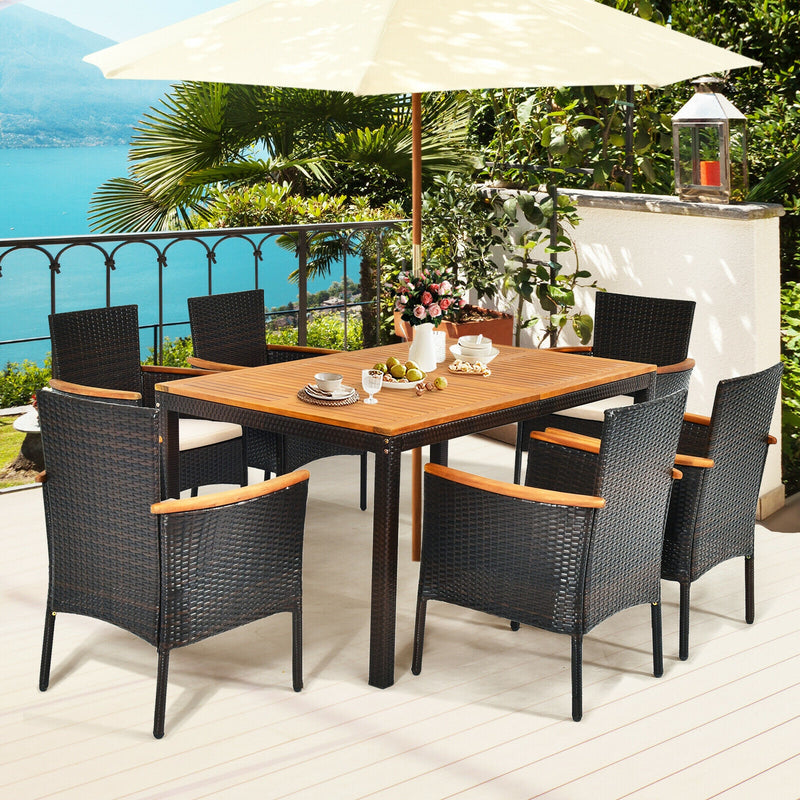 Costway - 7 Pieces Patio Rattan Dining Set with Armrest Cushioned Chair and Umbrella Hole