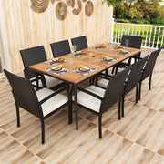 Costway - 9-Piece Patio Dining Set with Umbrella Hole and 8 Rattan-woven Dining Chairs with Seat Cushions