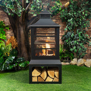 Deko Living - 26" Square Outdoor Steel Wood Burning Fireplace with Cast Iron Cooking Grill, Log Storage and Poker